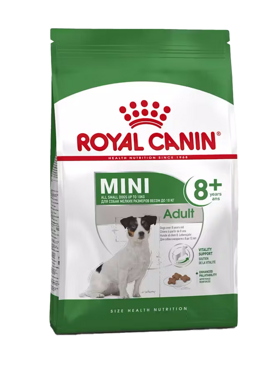 Royal Canin Mini Adult 8+ dog food packaging on a white background
